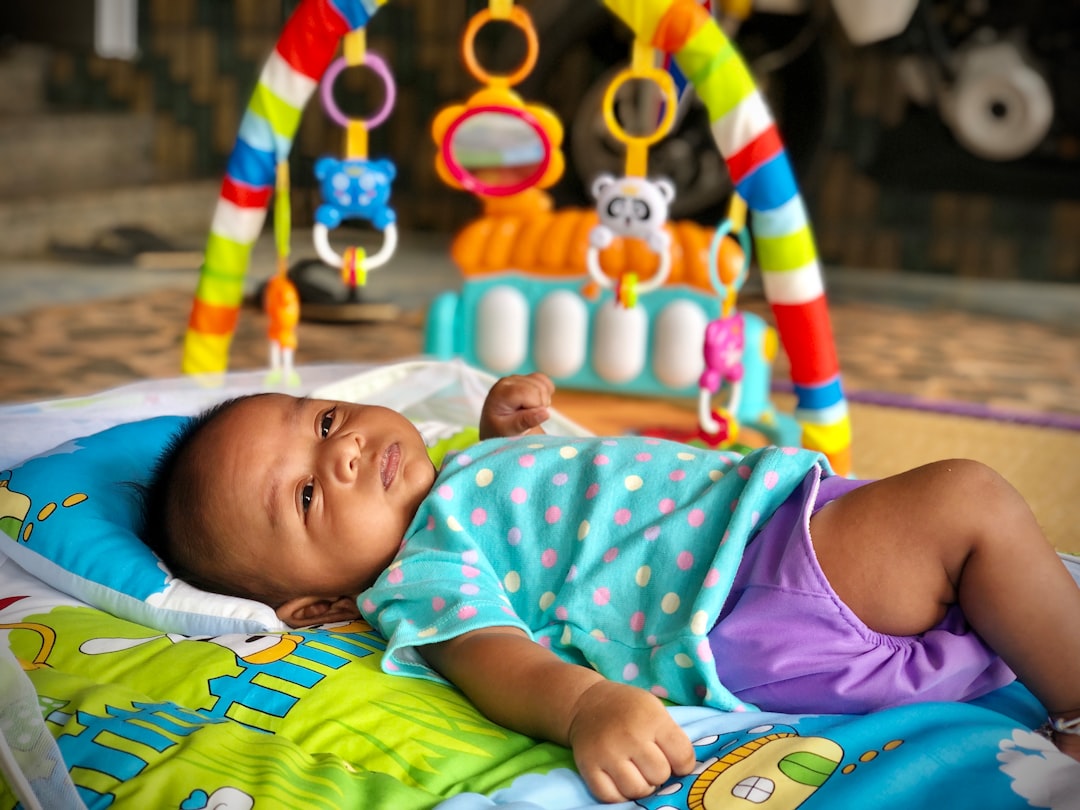 2-month-old baby suffocates in 'cluttered' portable playard due to 'unsafe sleep environment' at unlicensed day care, cops say